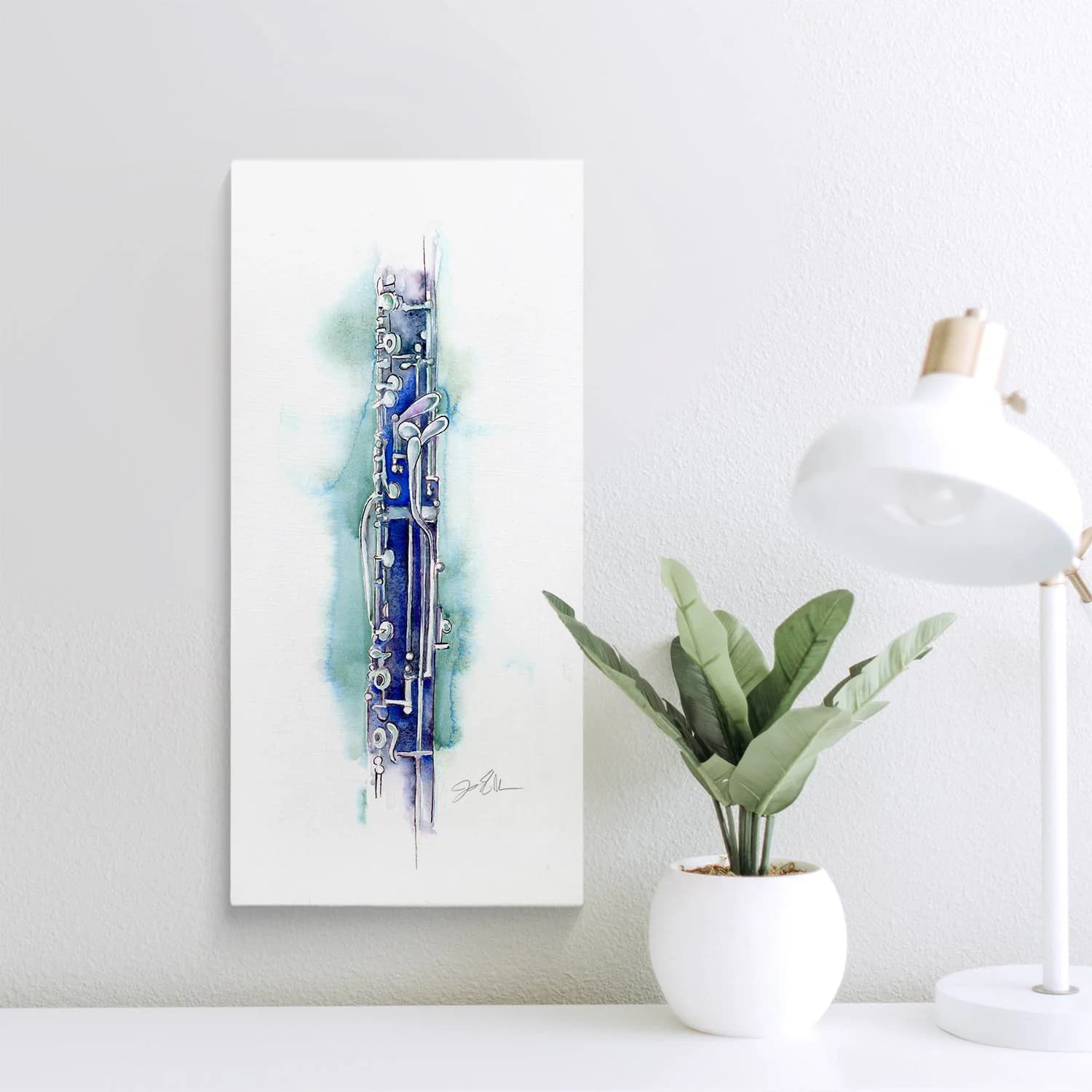 Jamie Hansen’s English Horn in Blueberry displayed on a wall beside a plant and lamp.
